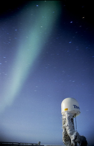 [AuroraAboveAntenna1.jpg]
A faint aurora above a satellite antenna is revealed by a long exposure.