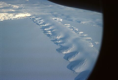 [Cappelle103.jpg]
Glacier on the sea ice near McMurdo. This glacier coming down Mt Erebus at about 160m per year extends to about 12km on the sea ice. In summer the sea ice breaks away, taking pieces of the glacier with it and forming the side waves clearly visible on the image.