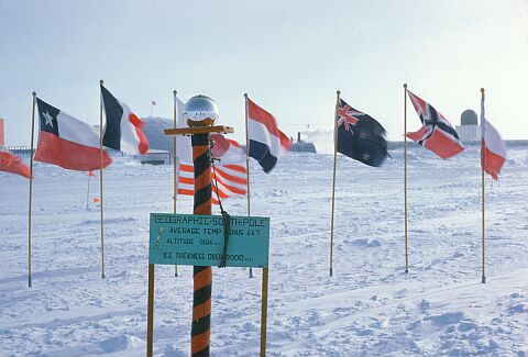 [Cappelle141.jpg]
The 'ceremonial' south pole, next to the Amundsen-Scott station, moves along with the base and the ice plateau (image © Thierry Cappelle 1977, used with permission).