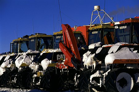 [DC_TraverseSpecial.jpg]
The tractors lined up for the night. This is to minimize the accumulation of snow between them in case of wind, and also to minimize the length of the electric cables needed to carry power to keep them warm for the night.