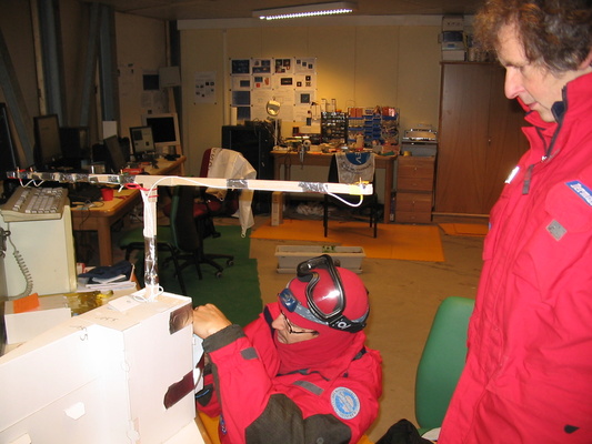 [20050318_32_PrepareProbe.jpg]
Karim and Roberto preparing a probe before a balloon launch.