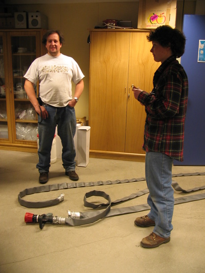 [20050422_32_FireDrillExplain.jpg]
Michel and Claire reviewing the drill at the end of the hoses.