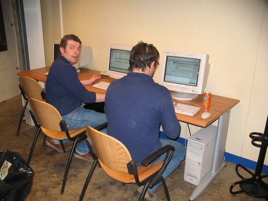 [20050427_16_ComputerRoom.jpg]
Michel and Jeff preparing their emails in the computer room.