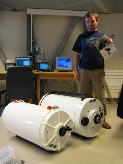 [20051110_004_EricScopes_.jpg]
Eric, the new astronomer, in front of his new C14 and C16 scopes.