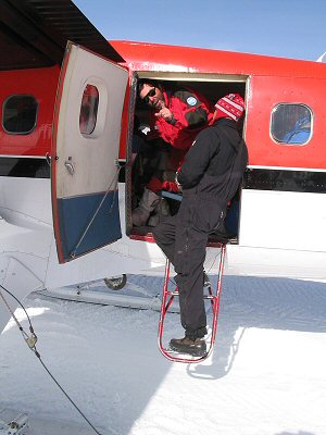 [CarloLeaving.jpg]
Carlo Malagoli, the logistics manager and most ancient resident of Dome C, giving his last orders as the pilot is trying to push him inside the plane.