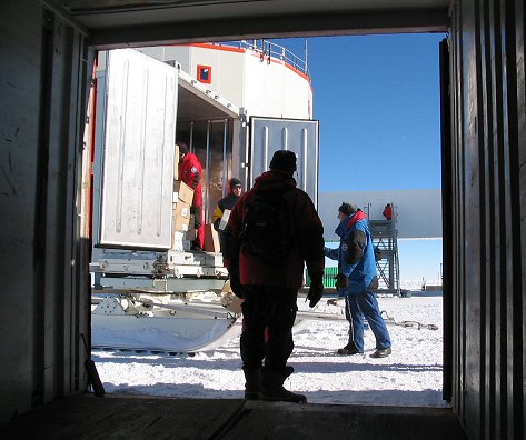 [FoodTransferInside.jpg]
Transferring frozen goods from one container to the next. The empty one will ride back to DdU.