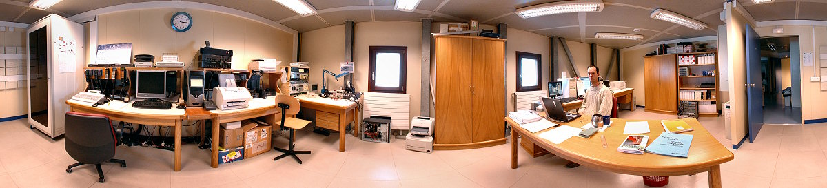 [PanoRadio.jpg]
Also on the 3rd floor of the quiet building, the radio communication room where all the Inmarsat, Irridium and old-fashioned radio systems are located, as well as the mail servers and the local domain server. With Pascal in charge.