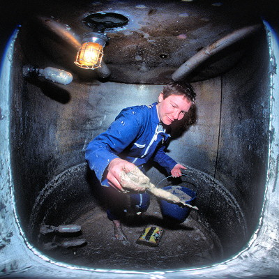 [CleaningWaterSystem2FHW.jpg]
An example showing the use of a fisheye lens to take a picture of a round object, in this case a duct opening (okay, this is not perfectly framed, but you get the point). Claire inside a water recycling tanks, cleaning the mud from the bottom. See and compare the similar straightened image farther down.