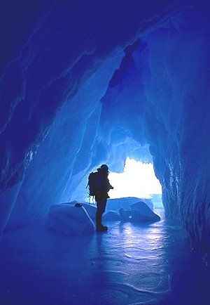 [IceCave.jpg]
Grosnitho at the entrance of a small cave inside an iceberg. The smooth ground is formed by frozen sea-water seeping through the ground. Some of those caves are very unstable, full of fallen blocks, others smooth and long-lasting like this one.