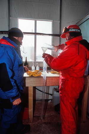 [DrillFluidPackFill.jpg]
Preparing a bag of drill fluid to insert into the drill before sending it down.