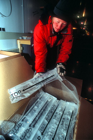 [IceCoreBoxes.jpg]
Inger putting the cores into cold storage boxes after wrapping them up with details written on 