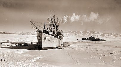 [ANT6.jpg]
USS Arneb (AKA-56) bringing in supplies in summer (lots of cold beer). With Mt. Erebus in the background, the only active Antarctic volcano.