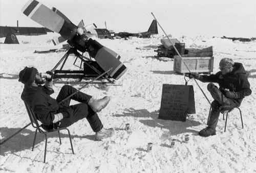 [319breaktime.jpg]
Taking a break at the Dome Charlie repair camp. Sign reads as follows: We've been doing so much for so long with so little that now we can do anything with nothing forever!