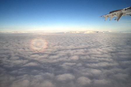 [BrockenSpectrumFlight2.jpg]
A Brocken spectrum seen from an airplane flying above the Transantarctic range, when the shadow of the aircraft is projected on the clouds below.