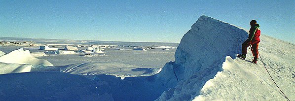 [LookBase.jpg]
GrosNitho on top of a pyramidal and easy iceberg, looking towards the station of Dumont d'Urville, far out on the island. One more of those 'bergs that could be climbed without particular gear. I even managed to do one with cross country skis, although it was a bit steep.