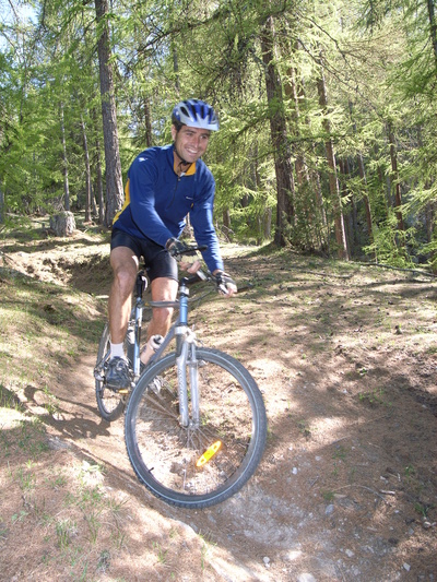 [20060525_0011668_MelezinBike.jpg]
Vincent coming down the Melezin trail. From Briançon, head to Villard, then up Les Ayes valley. After the little village of Les Ayes, take a side road to Malezin where a trail between the houses comes straight down the forest (steep in places).