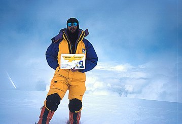 [FrancescoSummit.jpg]
Francesco on the summit holding a sponsor's tag. Unfortunately it was a bit too cloudy to see Everest properly.