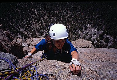 [Mainliner.jpg]
One of the best place in Lumpy Ridge is the Sundance Buttress. It has the longest approach, so it is the least crowded... Here's Jenny finishing one of the upper pitches of Mainliner, a stellar route.