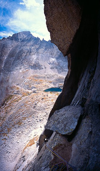 [SpearHead_VPano.jpg]
Vertical panorama of the 6th pitch, right under the crux roof. That's the sickle. The traverse after the Keyhole of Longs Peak is visible.