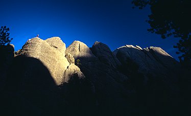 [SunsetRushmore.jpg]
Sunset on Mt Rushmore towers while Max and Jenny are rappelling.