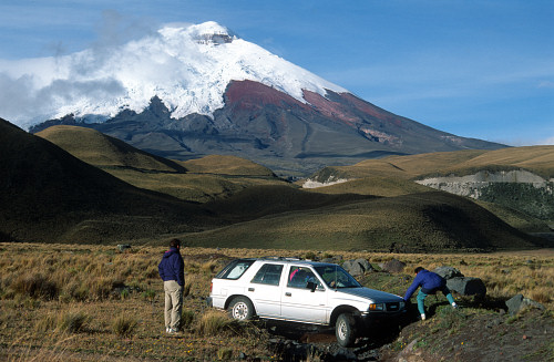 [CotopaxiCar.jpg]
In the back is Cotopaxi, the highest active volcano at 5897m (or 5911m, depending on the less than accurate maps). Here we ditched the car (a rented 4wd that was really only 2wd) on our way to do some acclimatization summit. Unlike Peru, a car is necessary to move from mountain to mountain.