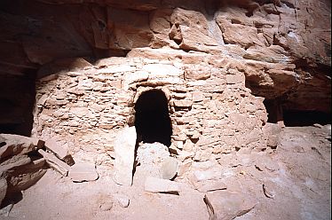[AnasazieDoor.jpg]
Anasazie (or Basketmaker or Pueblo...) mud house and its door. Surprisingly small.