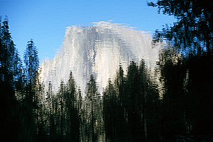 [HalfDomeBetweenTreesOverLap.jpg]
Reflection of Half Dome in the Merced river (Javascript animation, pass the mouse above the image, Internet Explorer only [sorry]).