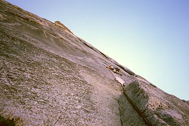 [HalfDomeSlab.jpg]
The Robbins traverse signs the start of the difficulties on the Regular North-West route of Half Dome.