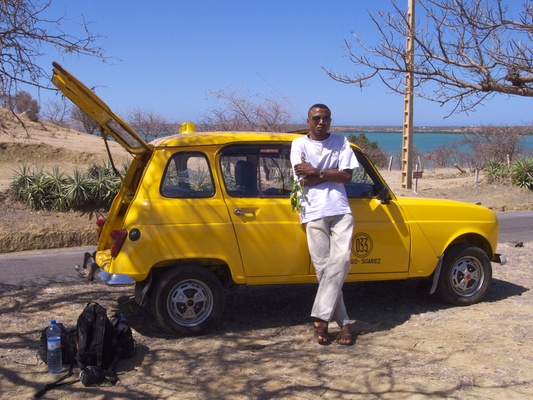 Left In Antsiranana all the taxis are archaic yellow Renault 4L