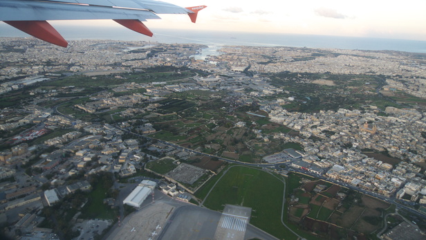 [20101103_175412_FlightOverMalta.jpg]
Flying over Malta upon arrival, one is surprised by how densely populated the island is. You basically go from one town to the next with only a few terraced fields in between.