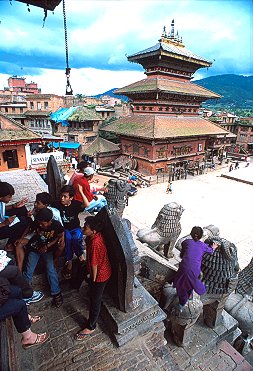 [UpTemple.jpg]
There were few tourists and the kids who usually work as self-appointed 
and non removable guides were spending their time talking sitting on the
 temples' steps or playing with kites. Many kites were visible on the 
electric wires or the temples adornments...