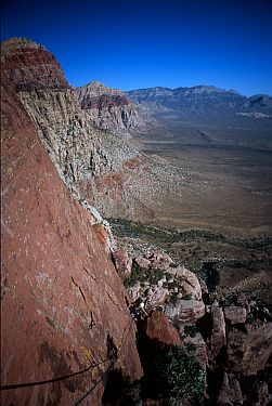 [ResolutionAreteRedWall.jpg]
Jenny high on the red wall of the Resolution Arete.