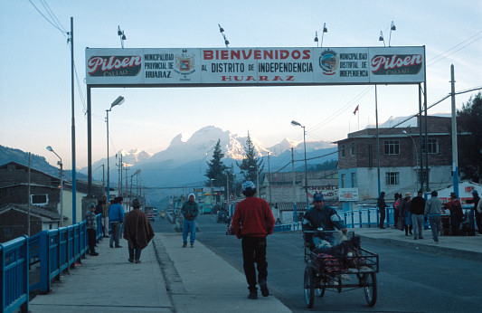 [HuarazEntry.jpg]
The city of Huaraz, base for climbers. On this picture are visible the multi-summit Huandoy (left), the mighty Huascaran with its two summits (center) and the pyramid of the Chopicalqui. This picture was taken from the bridge where most of the local buses leave. You can get to just about anywhere in a matter of hours with those fast and cheap (but crowded) buses.