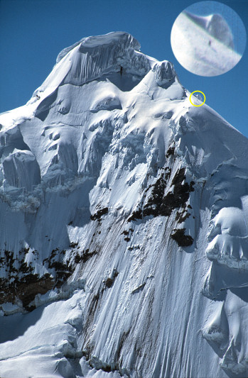 [ToclaFace1.jpg]
Tocllaraju seen from the Urus, I'm a small dot near the summit.