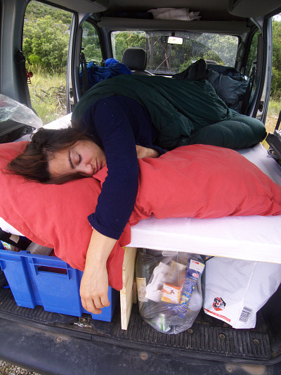 [20080608_080724_JennySleepKangoo.jpg]
Sleeping in the car after a day of cragging.