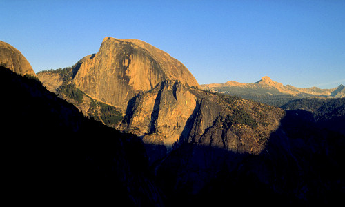 [HalfDome.jpg]
One of the 2 most famous pieces of rock in Yosemite: Half Dome as seen from the top of Yosemite Falls. The Snake Dike is on the right edge and there are some classic aid climbs on the facing wall (West face direct, Tusaack...).