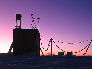 The glaciology shelter with various pumps on the roof