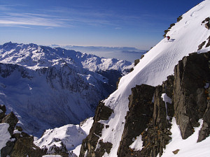 Ski start of the steep SW couloir of Arguille peak