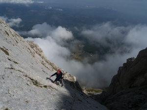 Climbing the slabs of the Clessidre route, Prima Spalla