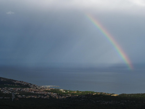 Rainbow above the mediterranean sea