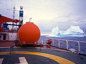 The Astrolabe coasting between icebergs
