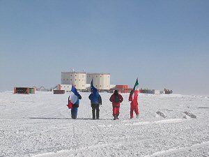Flag bearers walking back towards Concordia on the first hour of the winter-over
