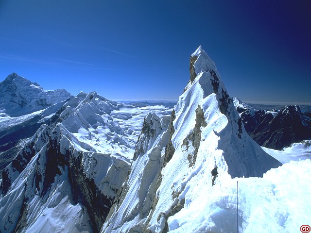 [CashanSummit.jpg]
Exposed narrow summit ridge of Nevado Cashan, Peru.