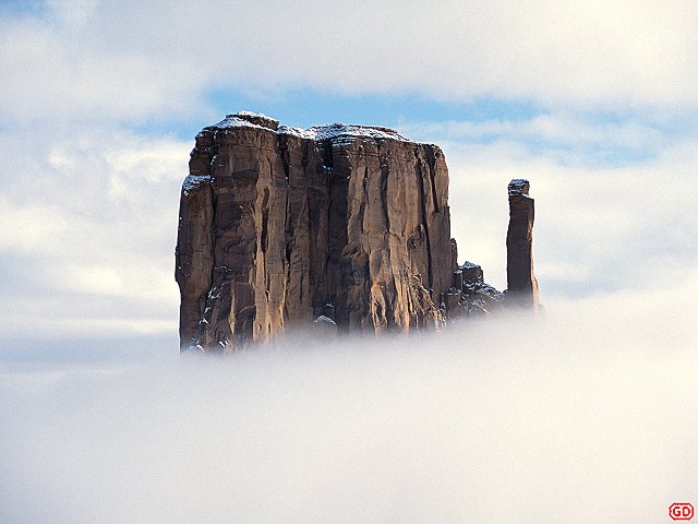 [CloudPiercing.jpg]
Sandstone tower piercing the clouds at Monument Valley, Arizona