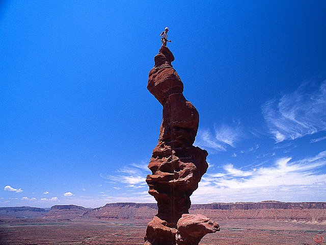 [CorkscrewH.jpg]
Jenny on the demented corkscrew summit of Ancient Art, Utah