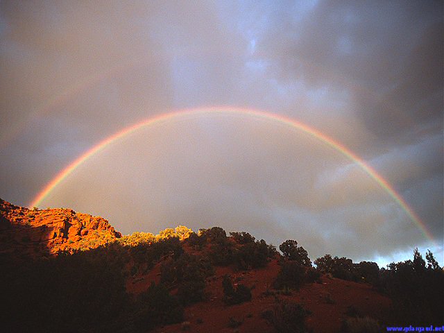 [FullDoubleRainbow.jpg]
Full double rainbow above the Utah desert, 2003.