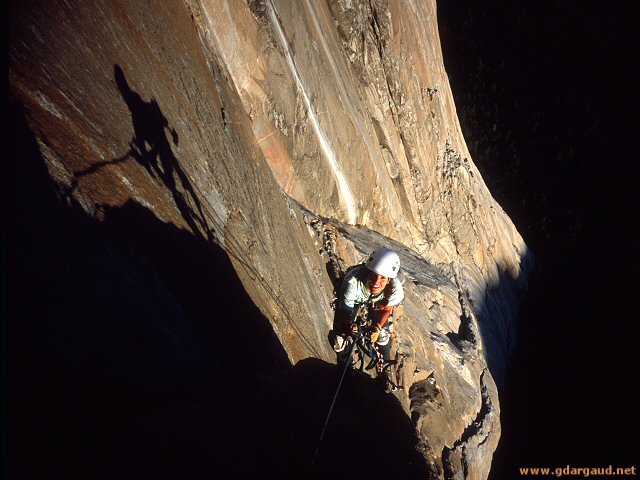 [SalatheHeadwallH.jpg]
Jenny reaching the headwall of the Salathé Wall in the sunset, El Capitan, Yosemite