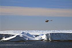Ice073 - Helicopter above icebergs