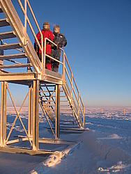 20050403_31_MichelClaireEntrance - Michel and Claire in full Antarctic garb on the entrance stairs.