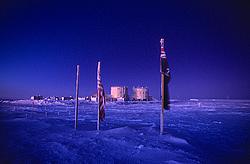 AastinoFlagsDark - Concordia station during the polar night.